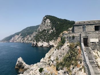 Panoramic view of sea and mountain against sky