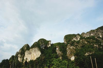 Low angle view of rocks against sky