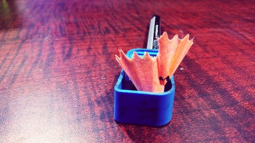 Close-up of pencil in sharpener on table