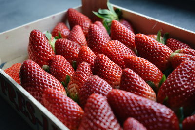 View of fresh strawberries in container