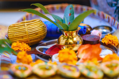 Close-up of multi colored flowers on table