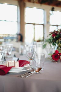 Plates and wineglasses on table 