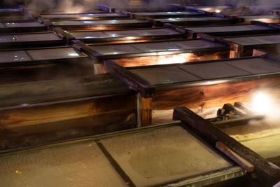 High angle view of illuminated container in building