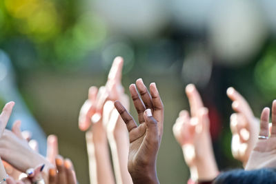 Cropped hands of people