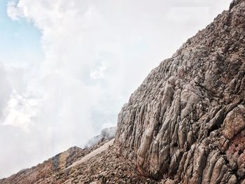 View of rocky mountain against sky