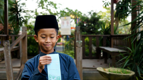 Portrait of boy looking at camera