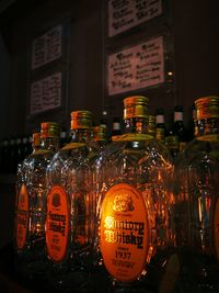 Close-up of illuminated bottles