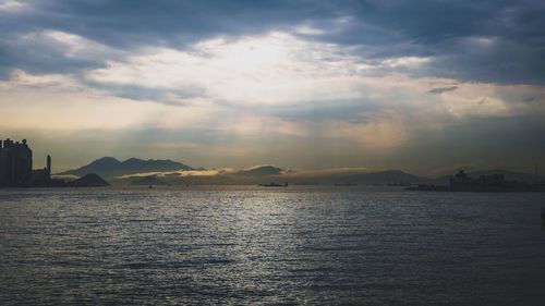 Scenic view of sea against cloudy sky