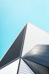 Low angle view of building against clear blue sky