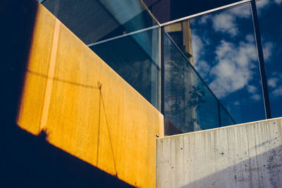 Low angle view of building against blue sky