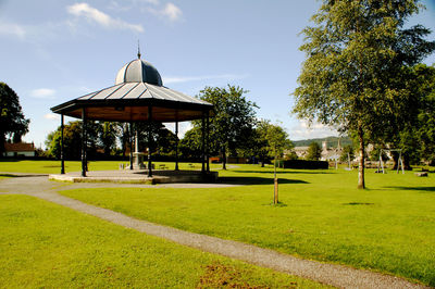 Gazebo in park against sky