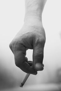 Close-up of person holding hands