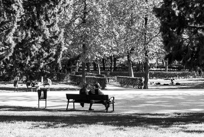 People relaxing in park