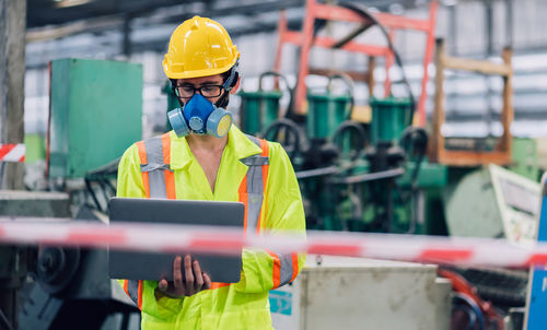 Man working with umbrella