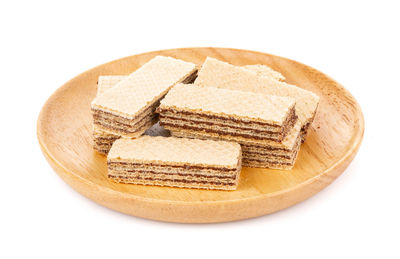 Close-up of bread against white background