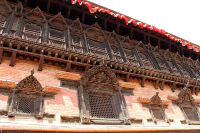 Low angle view of old building against sky