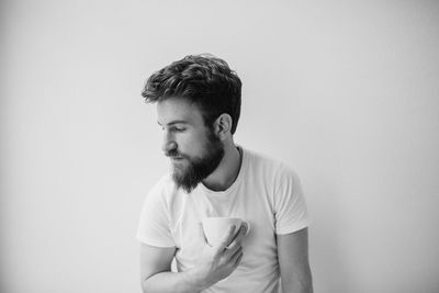 Portrait of man against white background