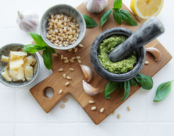 Fresh made pesto sauce. green basil pesto. ingredient for pesto sauce 