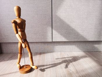 High angle view of stuffed toy on wooden floor