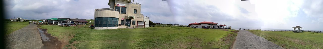 Panoramic view of houses against sky