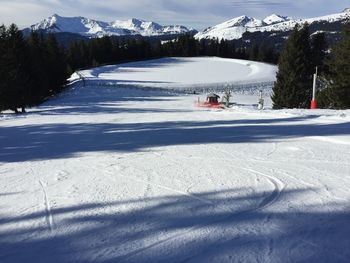 Scenic view of snow covered mountains