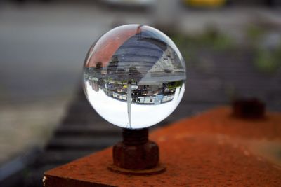 Close-up of glass against sky