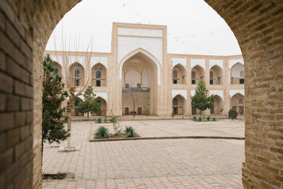 Bukhara, uzbekistan. december 2022. the courtyard of the kukeldash madrasah