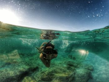 Portait of woman snorkeling in sea