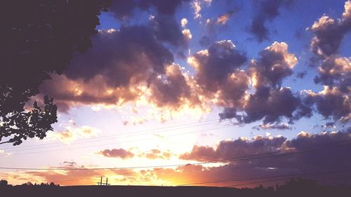 Scenic view of cloudy sky at sunset