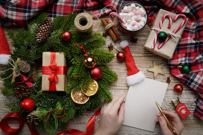 High angle view of christmas decorations on table