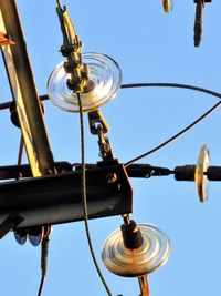 Low angle view of chain against sky