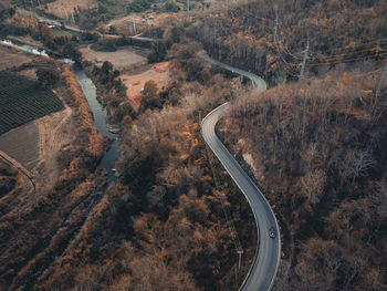 High angle view of tire tracks on road