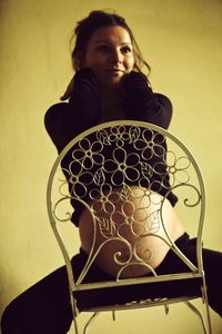 Young woman standing indoors