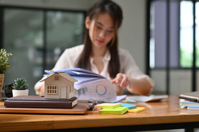 Woman looking at camera at home