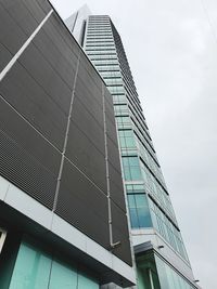 Low angle view of modern building against sky