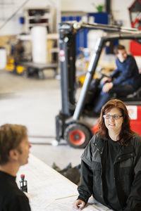 People working in warehouse