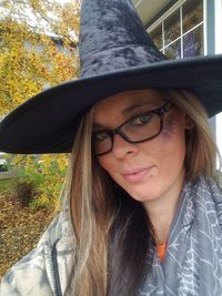 Close-up portrait of smiling young woman