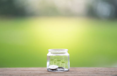 Close-up of glass of jar on table