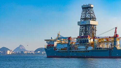 Ship in sea against sky