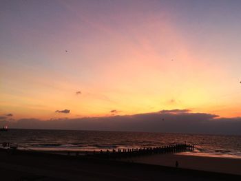 Scenic view of sea at sunset