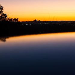 Scenic view of lake during sunset