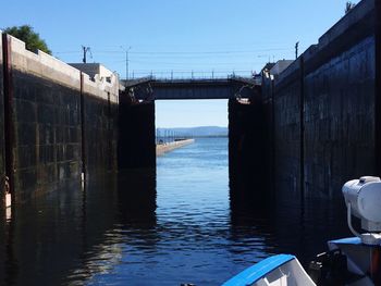 Bridge over river against clear sky