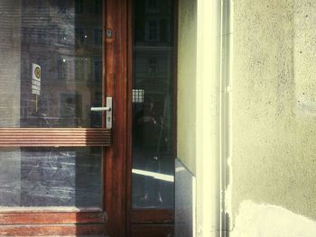 Reflection of building on glass window