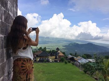 Woman standing on landscape
