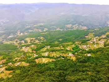 High angle view of field against mountains