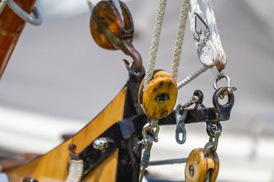 Close-up of chain hanging on rope