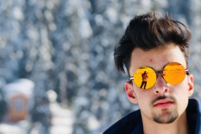 Portrait of young man wearing sunglasses