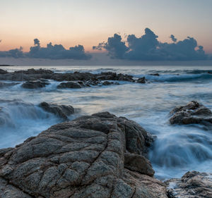 Scenic view of sea against sky during sunset