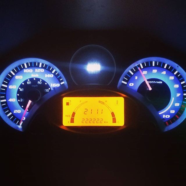 communication, text, transportation, illuminated, number, land vehicle, mode of transport, technology, car, close-up, western script, indoors, night, guidance, yellow, blue, speedometer, time, circle, clock