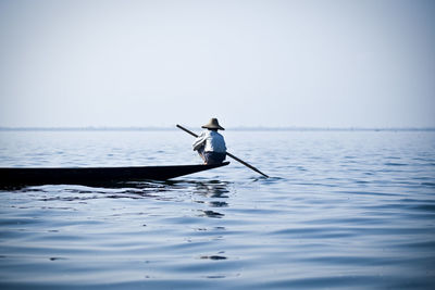 Man rowing on boat